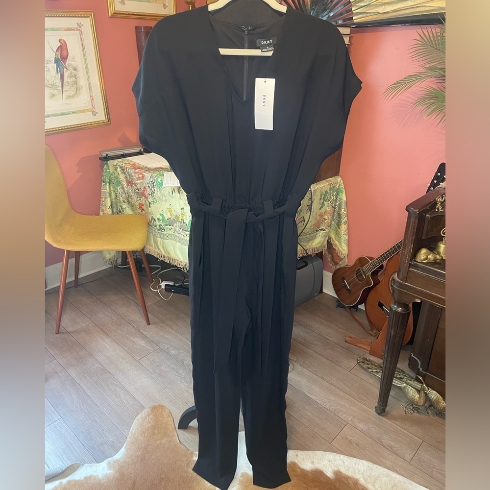 NWT DKNY V Neck Black Jumpsuit with belted waist. Size XS. Retail $150